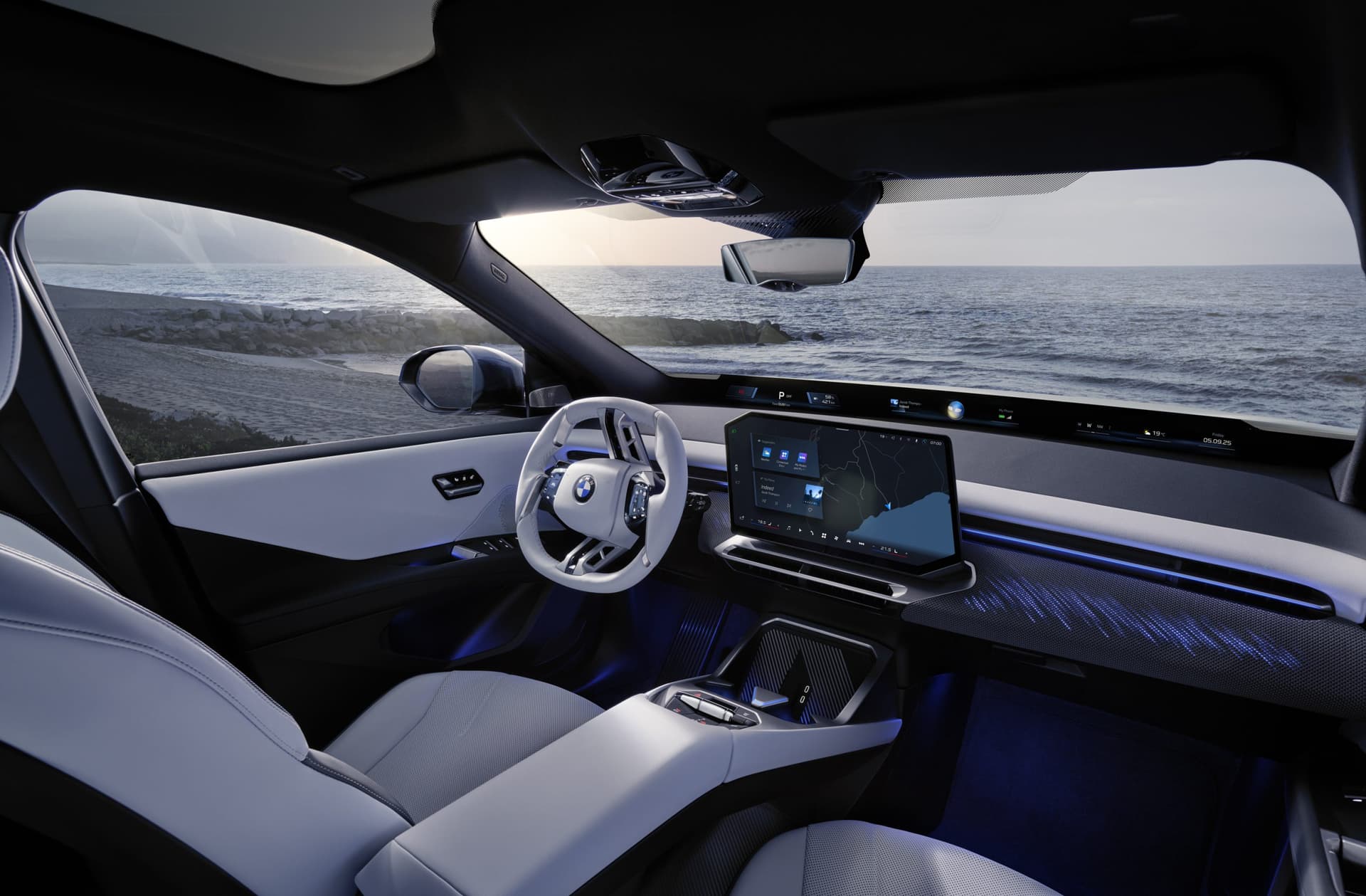 Kabina BMW iX3. Deska rozdzielcza, fotele